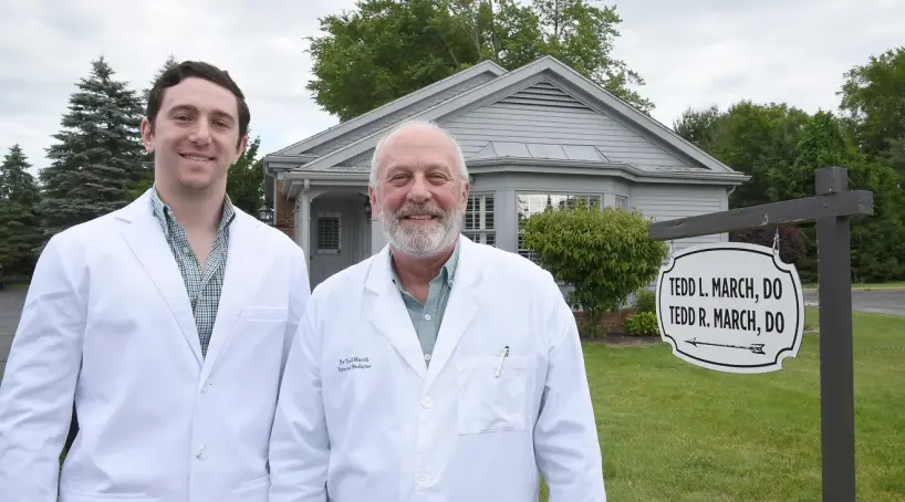 Dr. Tedd R March and Dr. Tedd L March outside March Medical Associates